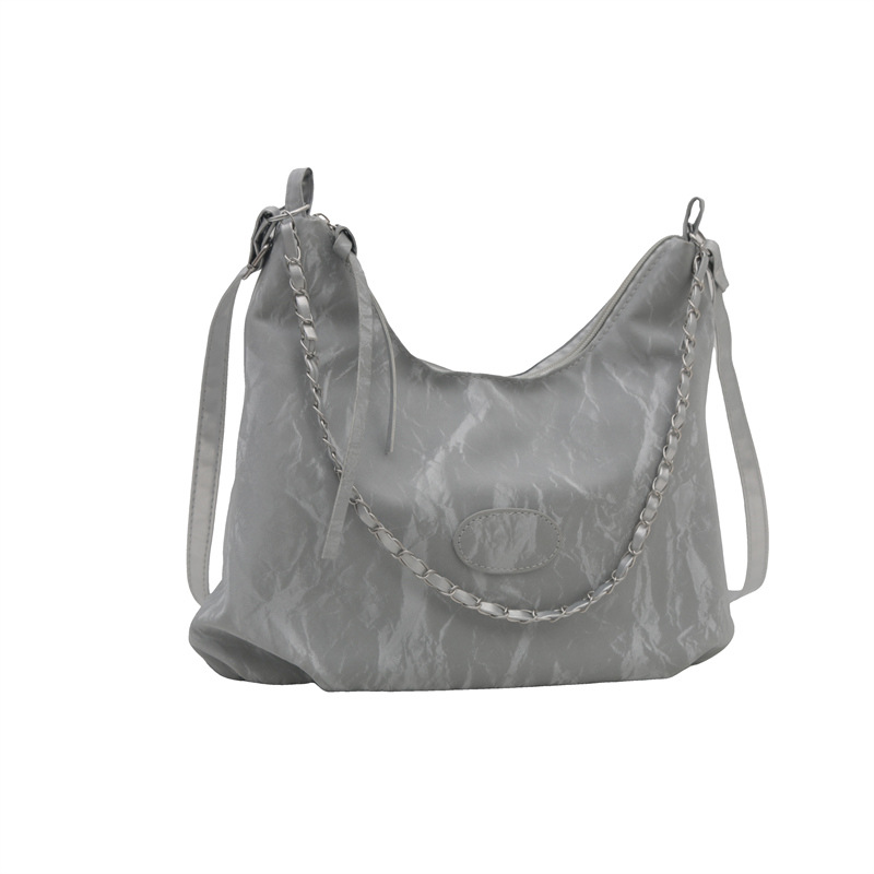 Bolso bandolera casual de gran capacidad, comercio exterior femenino, bolso de hombro de todo fósforo para viajeros al por mayor, bolso portátil de cadena de color sólido