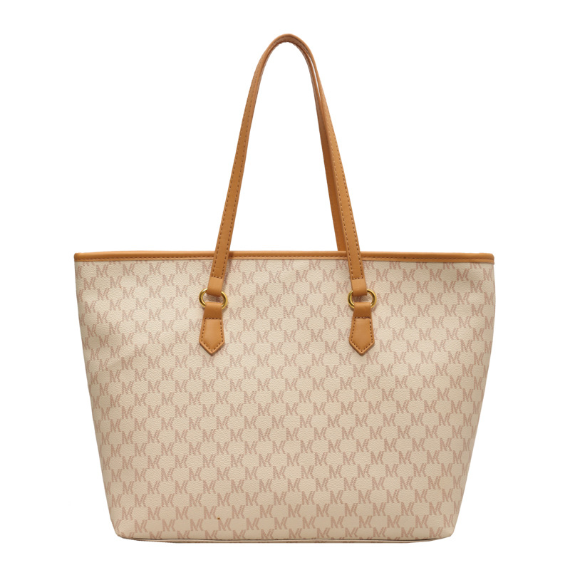 Bolsa de gran capacidad de dama de alta calidad 2025, nuevo tipo de bolso de hombro versátil, bolso de mano de viaje retro de moda