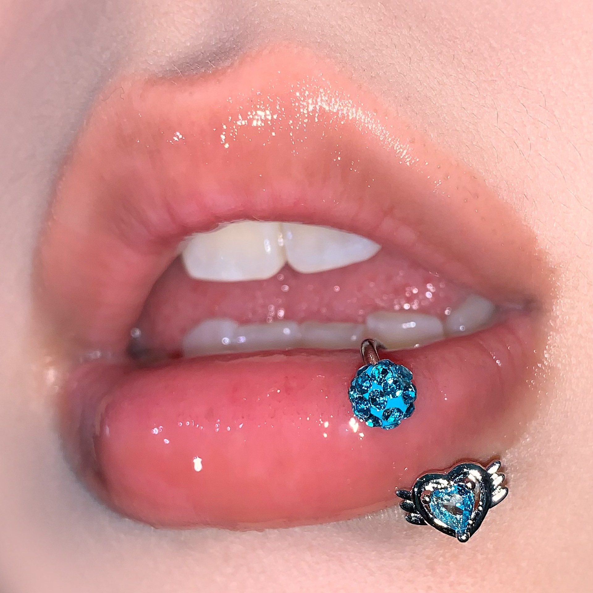Silver pointed spike labret stud material detail