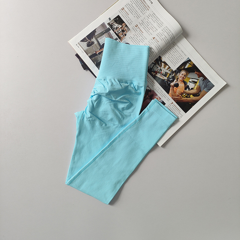 Pantalones de gimnasio sin costura europeos y estadounidenses, cintura alta, abdomen, caderas, pantalones de melocotón para correr, yoga, leggings apretadas