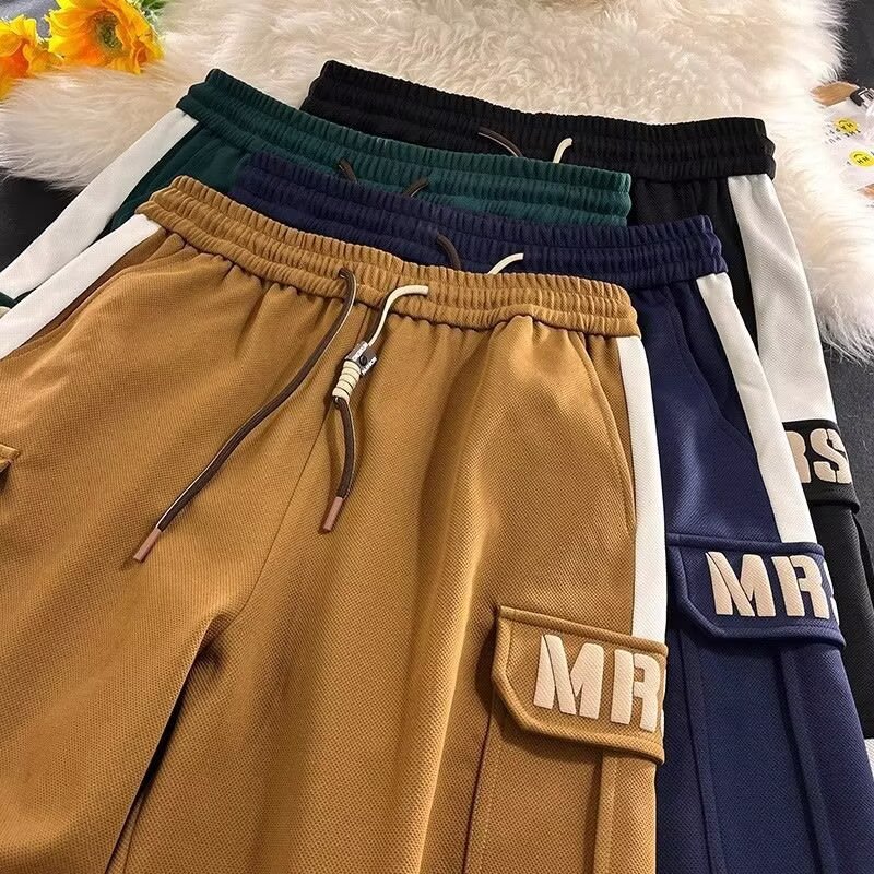 Pantalones cortos deportivos compactos para hombres de verano marca de moda retro espuma impresa pantalones casuales pantalones cortos sueltos de cinco puntos