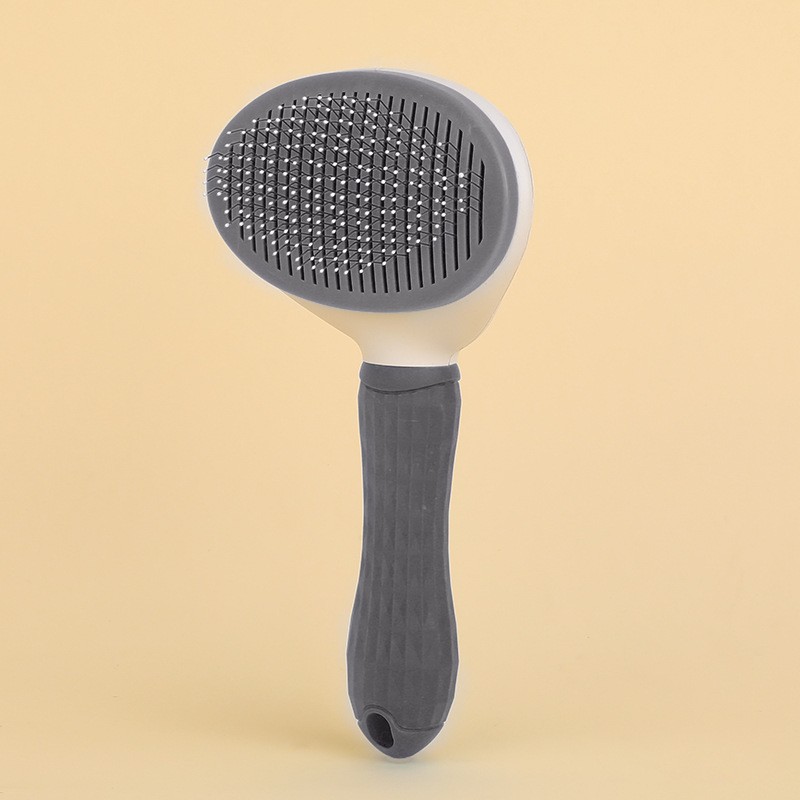 Peine para gatos de gran venta Peine para gatos con una tecla Peine para gatos Peine para cabello flotante de eliminación automática Peine para gatos Peine para mascotas Spot al por mayor