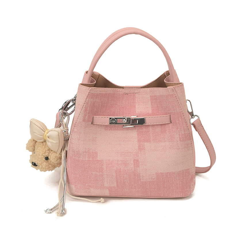 Comercio exterior transfronterizo coreano simple nicho de diseño de moda bolso de cubo para mujeres 2026 nuevo tipo de mujer mochila de hombro