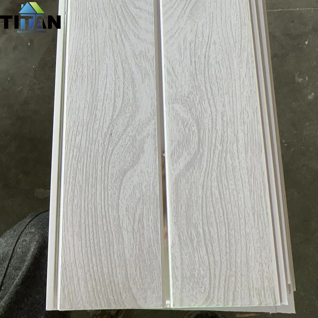 Fabricante transfronterizo de refuerzo largo de pvc techo de techo integrado tablero de ingeniería de techo material de decoración de plástico para techo