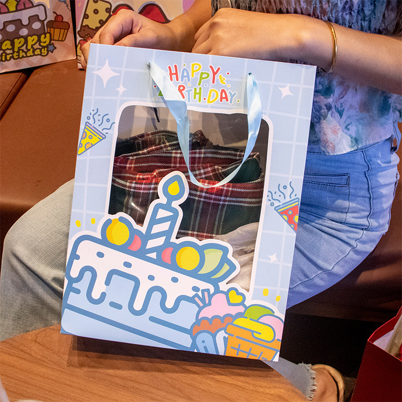 生日礼物开窗礼品袋包装袋幼儿园伴手礼手提纸袋相框娃娃开窗设计