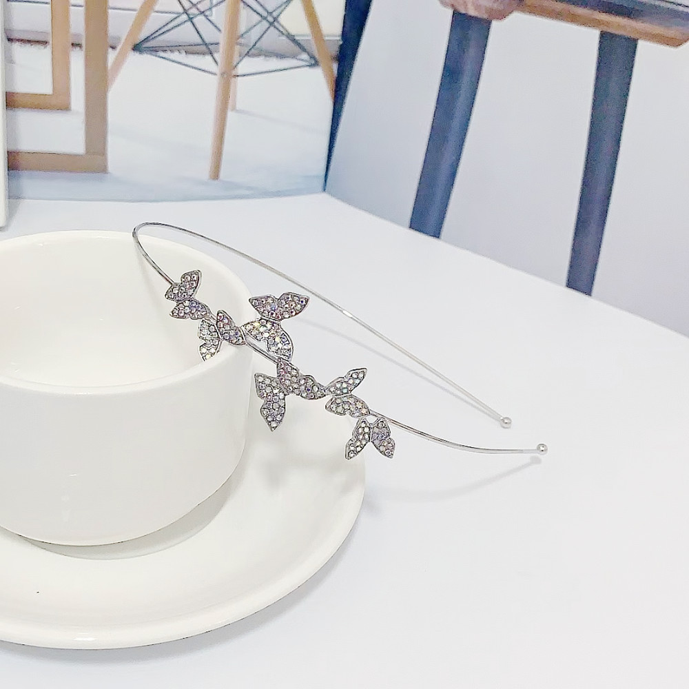 Corea del Sur Dongdaemun simple mariposa delgada diadema francés elegante diadema moda nuevo pelo presionando tocado para las mujeres