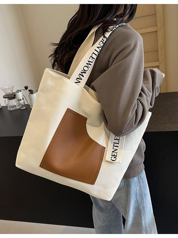 Fábrica directa tote bolsas de lona de niñas bolsas de hombro resistentes al desgaste simple letras impresión bolsas de comercio exterior transfronterizas