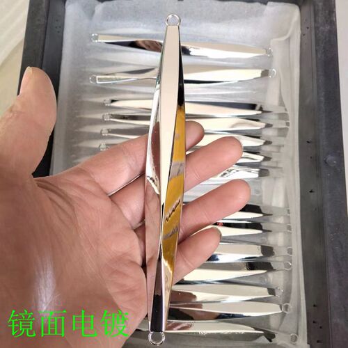 Factory wholesale deep sea slow rolling mirror electroplated iron plate lure glow in the dark offshore fishing tuna red oil sea wolf cross-border