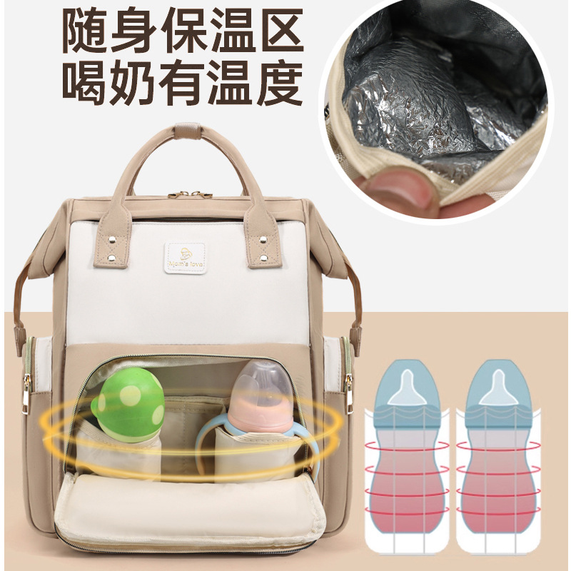Nueva bolsa de mamá transfronteriza, papel de aluminio de gran capacidad, preservación del calor y anti-salpicaduras, bolsa de madre e hijo, mochila multiusos con bebé