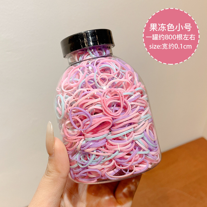 El cabello del bebé está atado, la banda elástica alta, la banda elástica desechable, la trompeta de color para niños no daña el cabello, la banda elástica pequeña