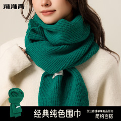緑のニットのマフラーの女性の冬の毛糸は純色の日本のカップルを合わせて保温して首を保護します。