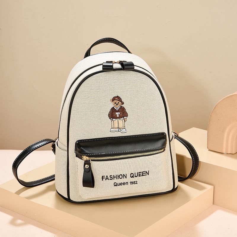 Mochila mujer 2025 nuevo estilo estudiante universitaria moda bordado mochila de viaje mochila de gran capacidad de doble uso