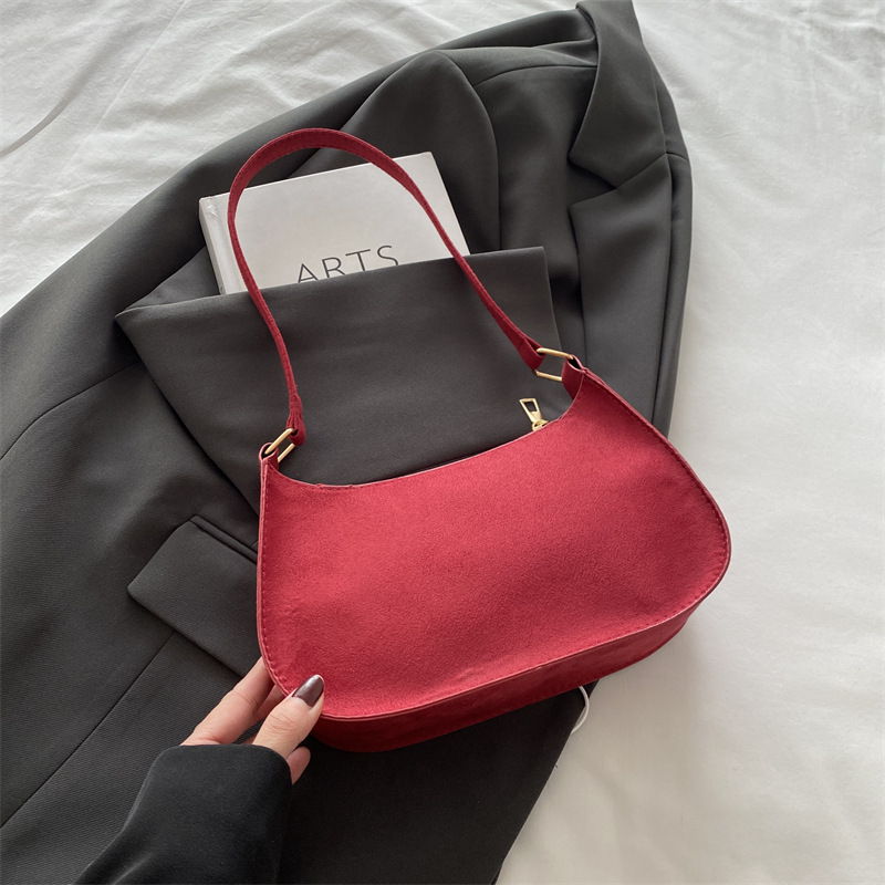 2024 invierno nuevo estilo de nicho de estilo retrógrado diseño de alto valor de la personalidad portátil de hombro de moda casual bolsas axilales