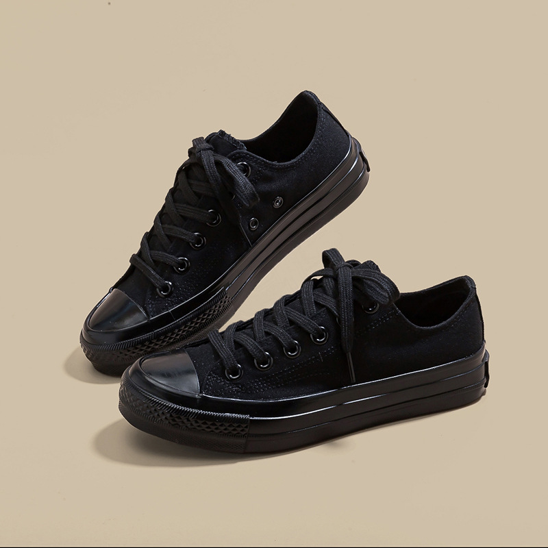 Zapatos de lona de tacón plano de mujer explosión baja estilo de moda coreano versátil estilo clásico retro nicho diseño zapatos de lona blancos image 12