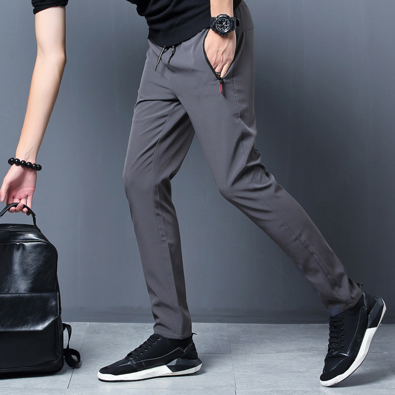 Men's autumn solid sports elastic casual trousers with zipper