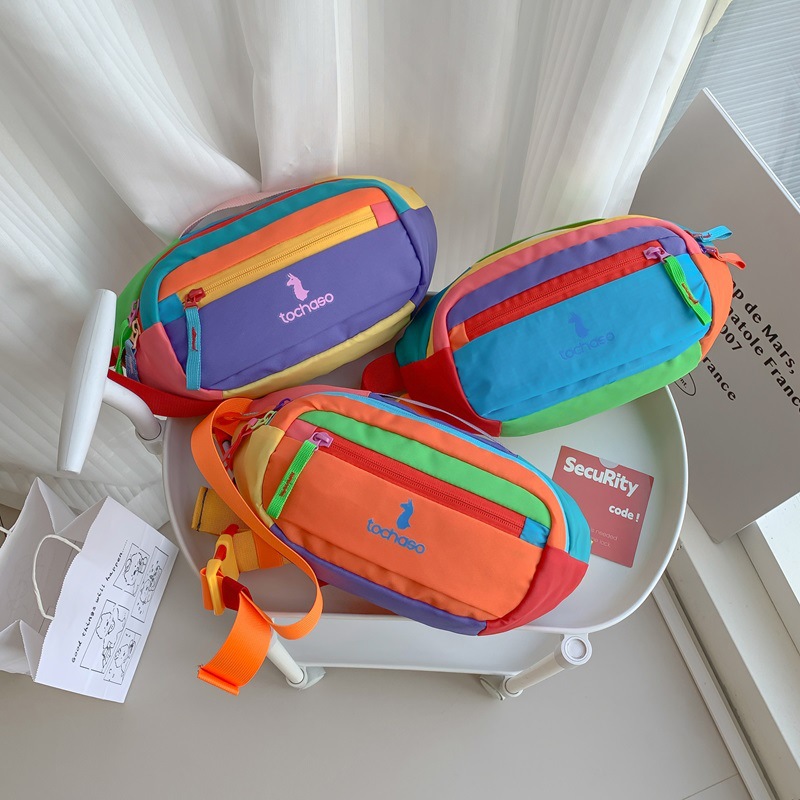 Korean-style color-blocked chest bag for boys and girls, stylish letter-printed kids' waist bag, large-capacity children's travel crossbody bag, trendy