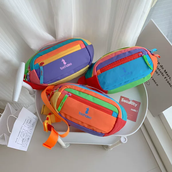 Korean-style color-blocked chest bag for boys and girls, stylish letter-printed kids' waist bag, large-capacity children's travel crossbody bag, trendy