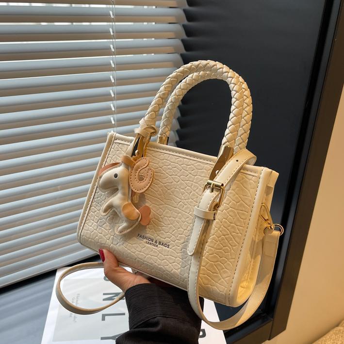 Bolso de mano transfronterizo para mujer 2025 nuevo estilo coreano simple y moderno bolso cuadrado pequeño bolso de mensajero de hombro de moda de viaje salvaje