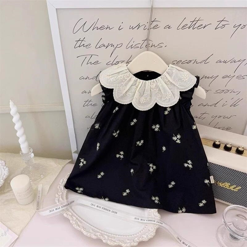 Xianning siete ropa para niños coreanos verano nuevo estilo bordado cuello de hoja de loto vestido floral negro falda chaleco sin mangas para niñas