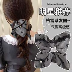 蝶結びのプリントの布芸の方巾の輪の大きい腸の輪の韓系の低い馬尾の縄の気質は髪の毛の縄を刺して女性を飾ります。