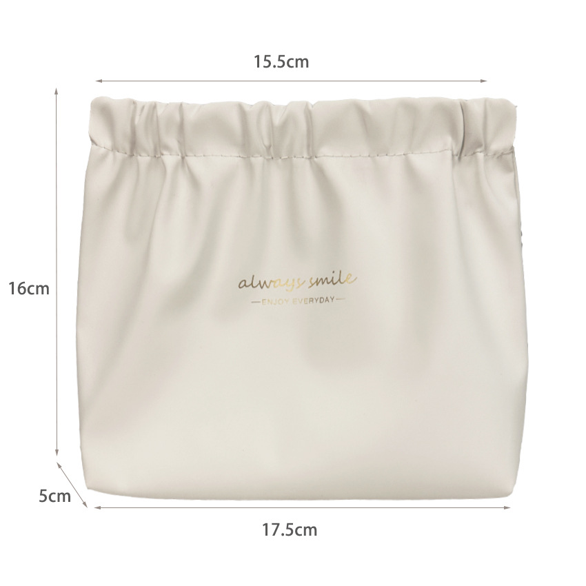 Nuevo impermeable pu bolsa de cosméticos lápiz labial de las mujeres sanitaria servilleta metralla bolsa de almacenamiento portátil cable de datos auriculares bolsa de almacenamiento