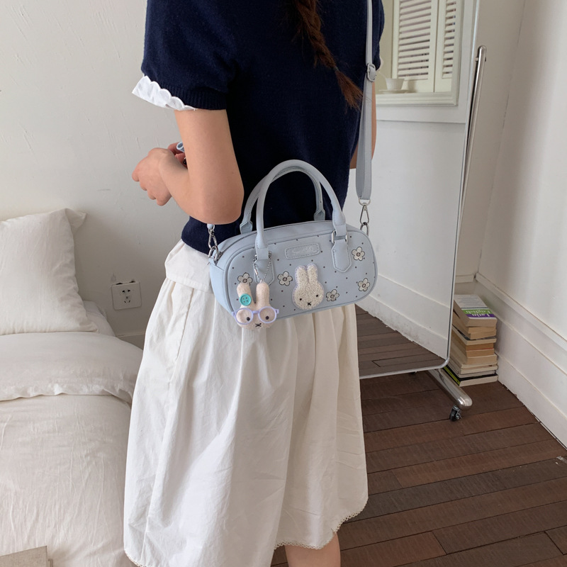 Dolce flor pequeña bolsa de Boston para mujeres 2026 nuevo bolso de mochila portátil bolso de almohada diario bolso de viaje de moda