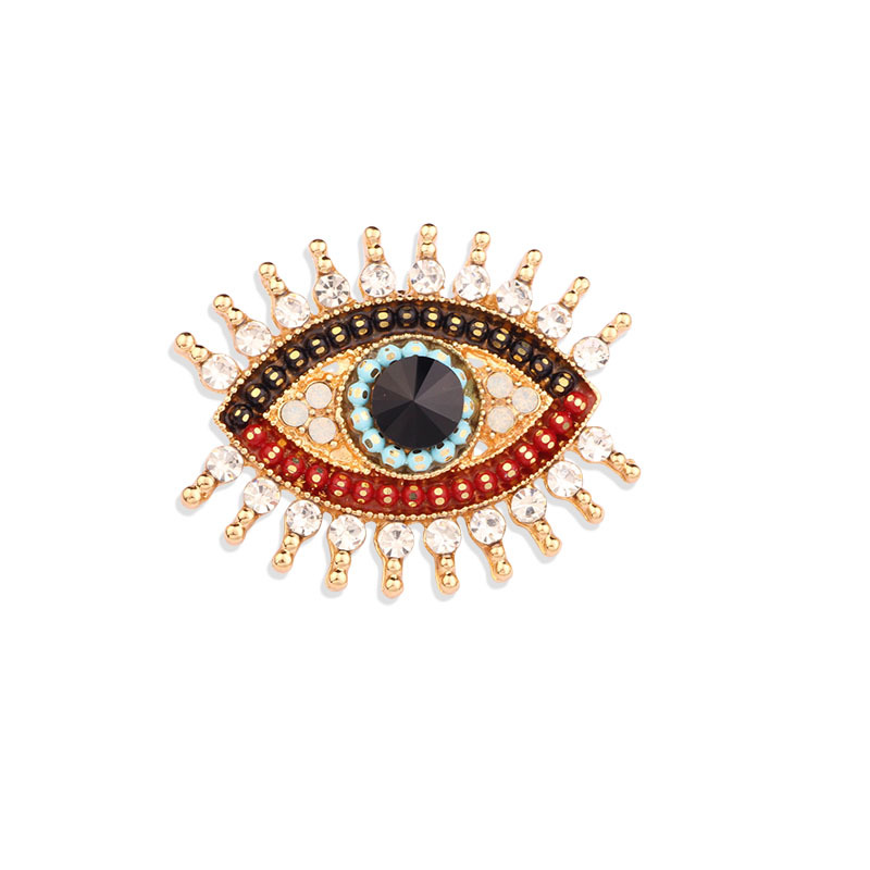 Retro simple Ángel ojo en línea broche de celebridad diamante femenino francés diablo ojo pecho ornamento