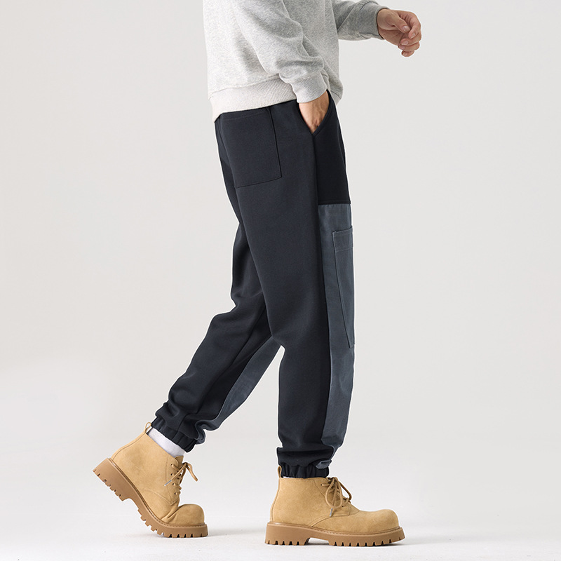 Mick Jones 2025, nuevos pantalones casuales de otoño, pantalones de guardia de hombre, pantalones grandes, pantalones de moda con etiquetas colgantes.