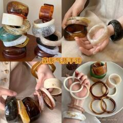 欧米の不規則なぼかしは波の広い面の腕輪を染めます。