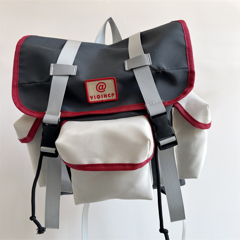 Mochila escolar para estudiantes de escuela primaria versión coreana de la mochila de deportes al aire libre de moda y fresca para niños
