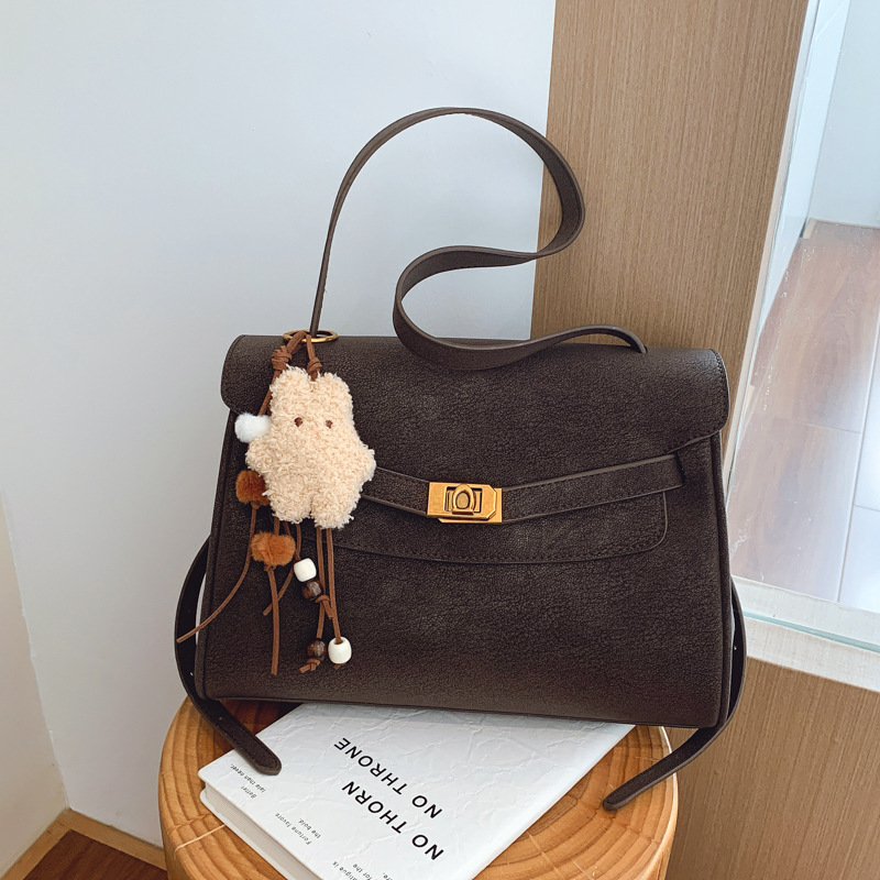 Retro esmaltado sensación diaria brazaleta para mujeres 2026 primavera nueva mujer esmaltado de lujo ligero hombro mochila