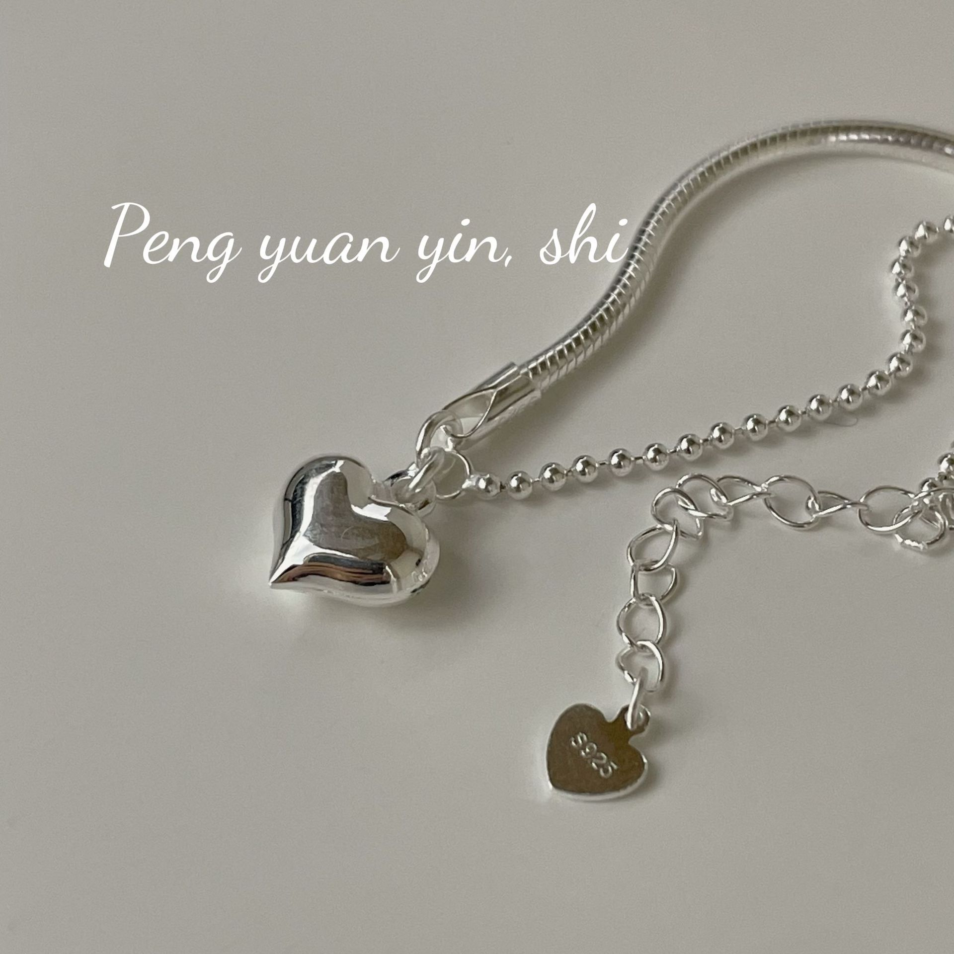 Bracciale a forma di cuore in argento sterling per donna, stile Niche Ins, design asimmetrico, leggero, sensazione di alta qualità, coreano_voghion.com