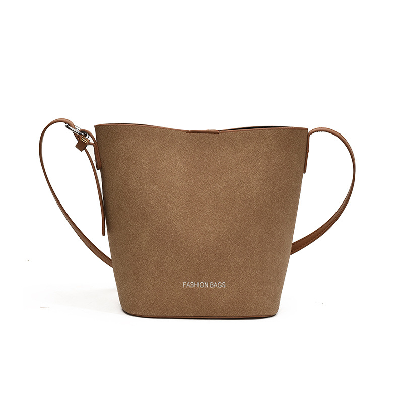 Bolsa de mano de seda retro esmerizada de alta calidad para mujeres 2025, nuevo bolso de balde de primavera simple y versátil.