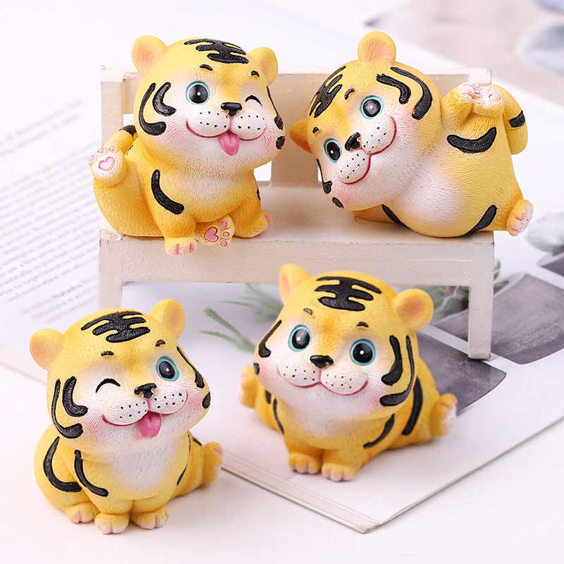 Car interior decorations cartoon cute little tiger desktop doll tiger year gift small ornaments car interior accessories wholesale