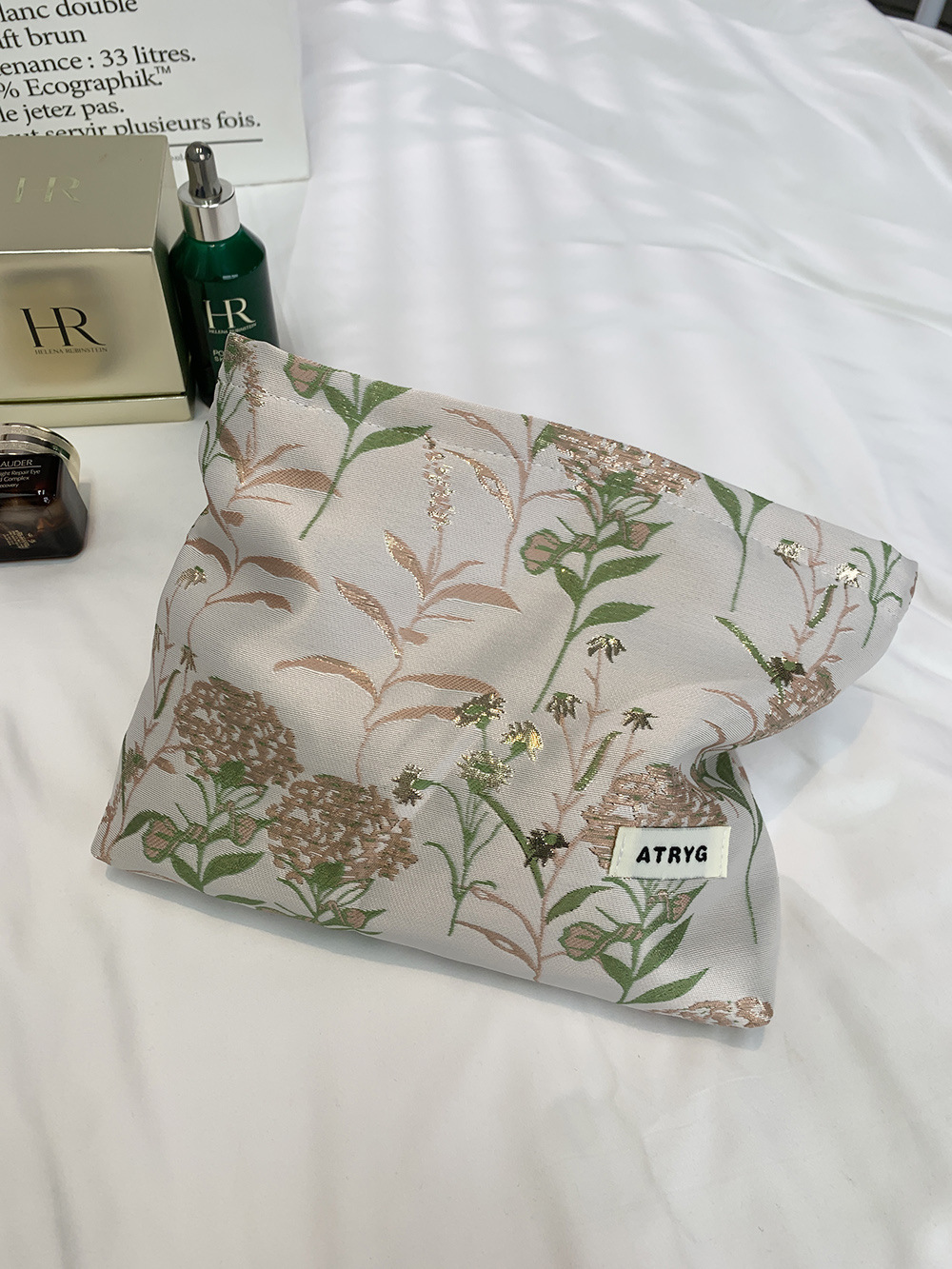 Bolsa de maquillaje, una pequeña bolsa fresca portátil de gran capacidad, bolsa de almacenamiento para productos de cuidado de la piel, bolsa de mano.