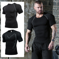 スポーツのレオタードのフィットネスの半袖の圧縮服のランニングのバスケットボールはトレーニングのジムの装備の速乾の服のtシャツに忠実です。