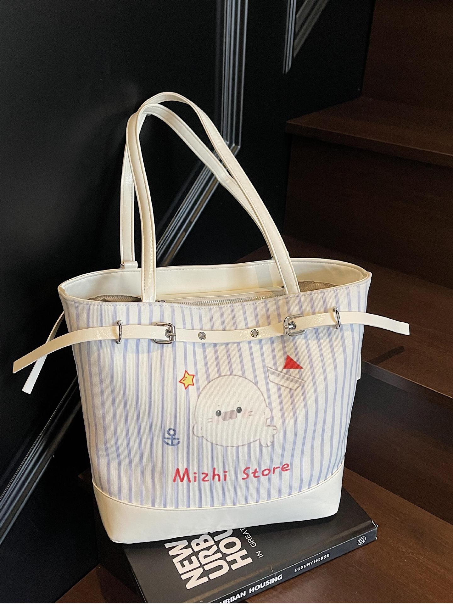 Bolsos de nuevos productos de nicho de Corea del Sur, bolsos de mensajero de estilo occidental de gran capacidad para mujeres 2025, bolsos de viaje de moda de todo fósforo