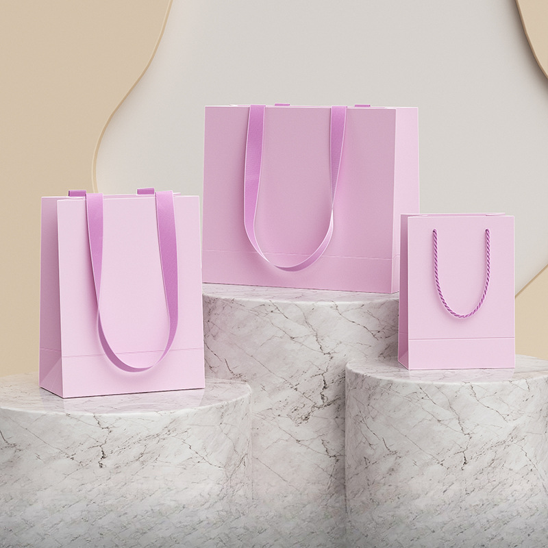 礼品袋奶油风浅紫色包装购物袋服饰店手提白卡纸袋定 做logo