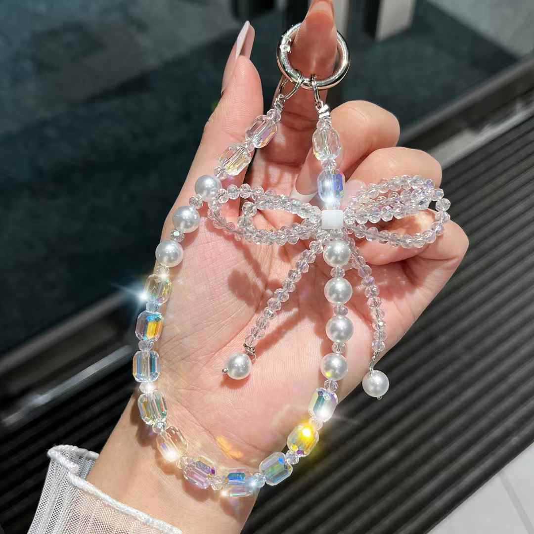 cadena de teléfono móvil estereoscópico de alta calidad arco de cristal caja de teléfono móvil colgante perla cuerdas de muñeca cuerdas de cuentas mujeres