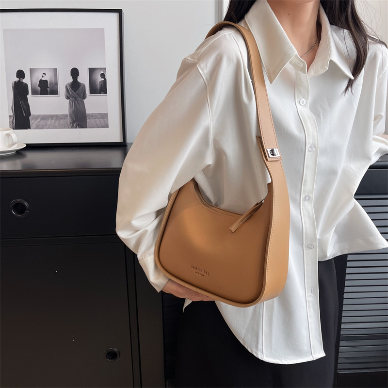 Advanced feeling 2024 new versatile women's solid color fashionable casual wide shoulder strap crossbody bag_voghion.com