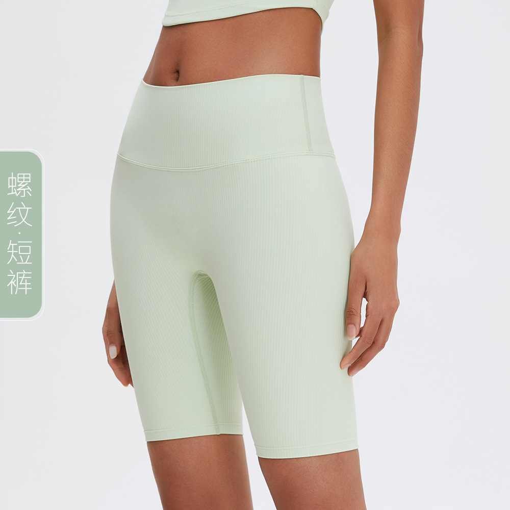 Nuevos pantalones de yoga deportivo cintura alta vientre contracción cadera que forma Pantalones deportivos sin vergüenza triángulo Área de secado rápido fitness yoga shorts