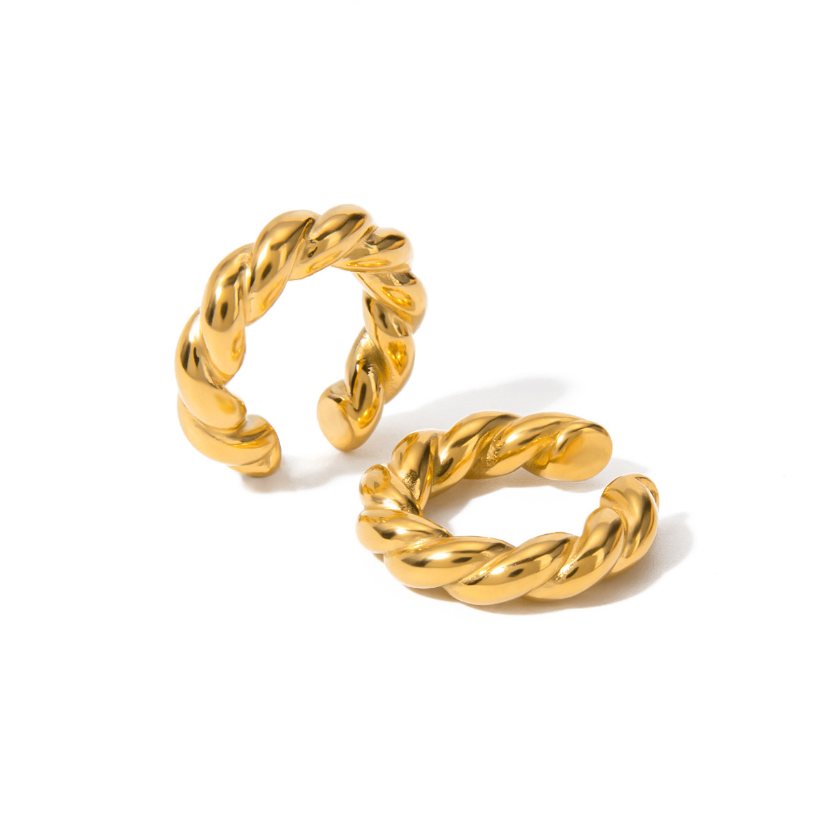 Europa y los Estados Unidos transfronterizos en el viento simple versátil de acero inoxidable de oro de 18 quilates en forma de cuerda de cáñamo redonda auriculares joyas para orejas mujeres