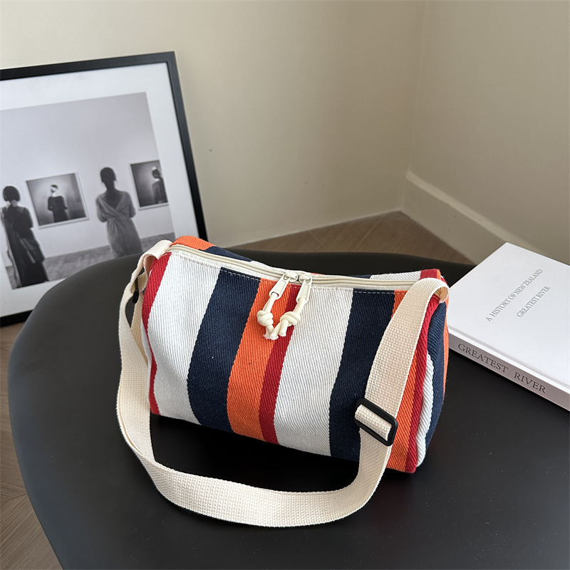 Bolsa de hombro coreana de gran capacidad para mujeres 2024 nuevo estilo simple a rayas verticales mochila casual bolso de almohada de moda