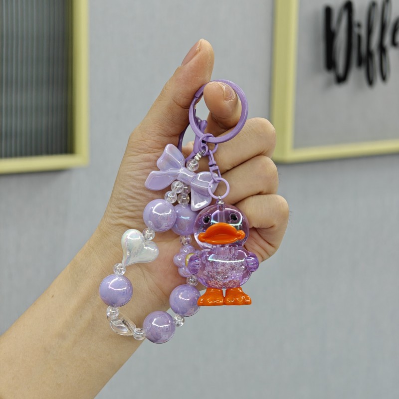 Acrílico cristal pato cuentas llavero lindos colgantes bolsos exquisitos colgantes muñeca máquina pequeños regalos al por mayor