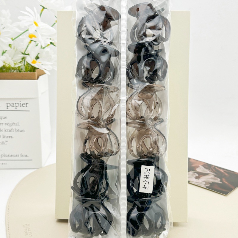 Pinza para el cabello de material PC irrompible color té con leche, pinza grande transparente color café para la parte posterior de la cabeza, accesorio para el cabello de supermercado a dos yuanes.