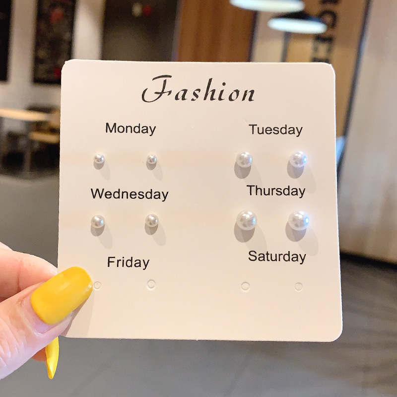 Ingresos franceses de perlas de moda femenina simple pendientes rojos ligeros de lujo versátiles pendientes de nicho de alta calidad