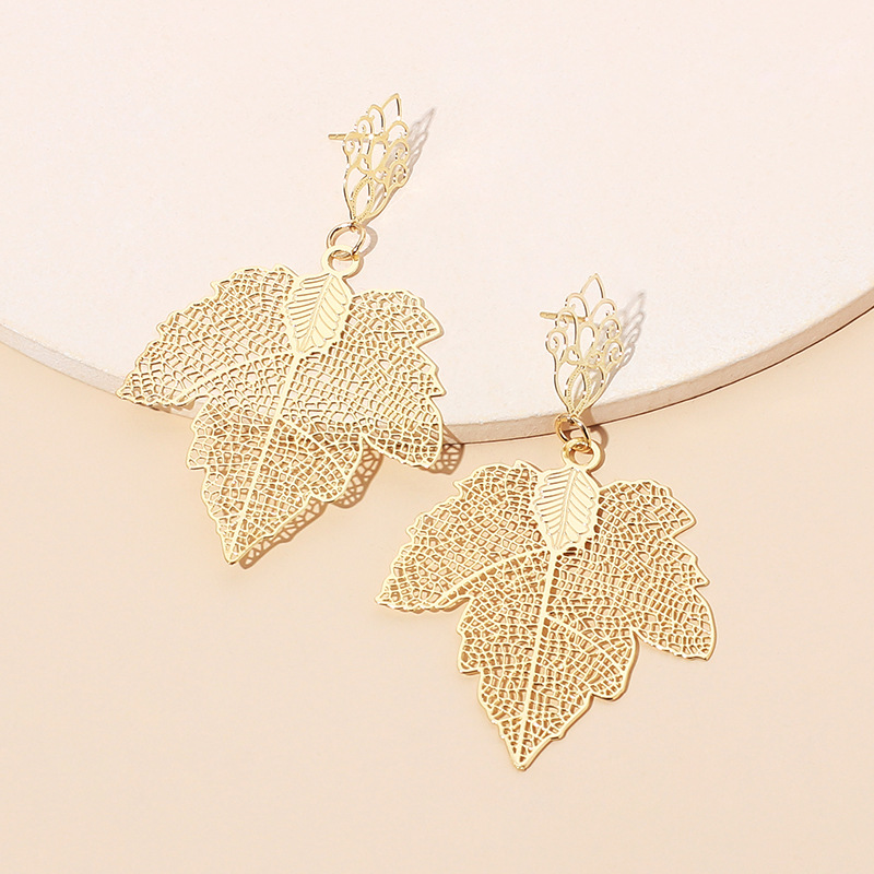 Retro Hollow Leaf Earrings display picture 3