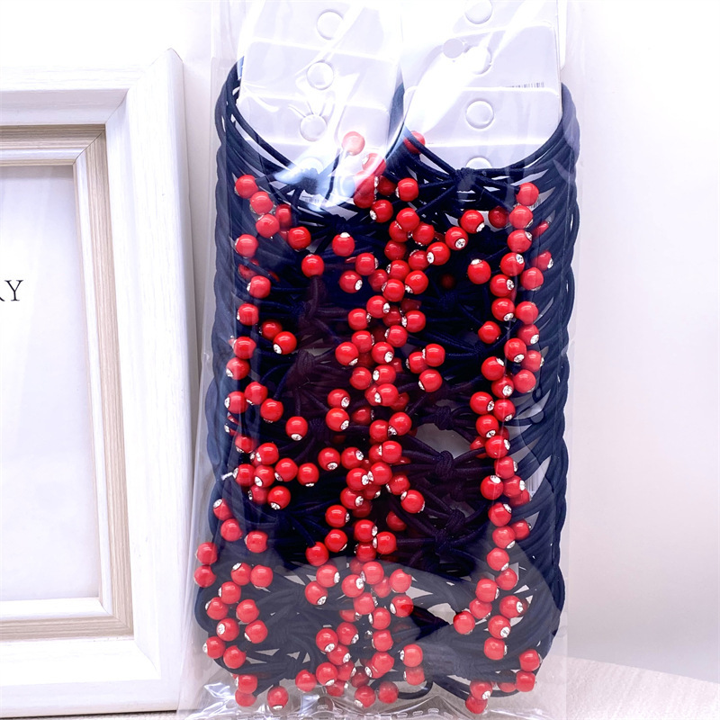 La versión coreana de la tarjeta colgante de té leche adornos de cabello nudo cinta de cuentas de cuerdas de alta elasticidad cuatro en uno correa de goma 2 tienda