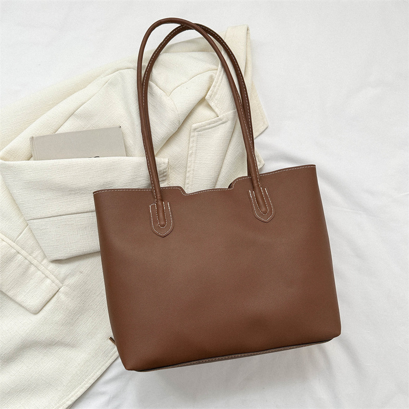 Estilo coreano versátil bolso texturizado de las mujeres 2023 otoño e invierno nuevo hombro axila bolsa popular bolsa de asas este año