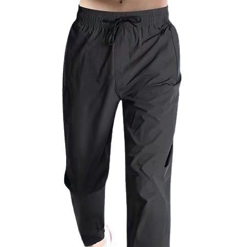 Pantalones deportivos para hombres entrenamiento de acondicionamiento físico hielo de verano delgado rápido secado ocio piezos de corrección deportiva pantalones de tejido